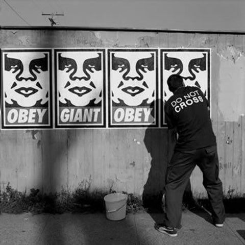 THE WORLD BEHIND THE FOUR LETTERS